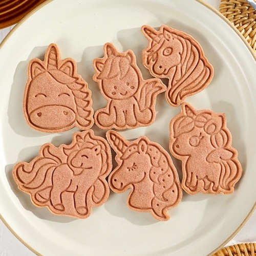 Cookie cutters and unicorn shaped cookie markers